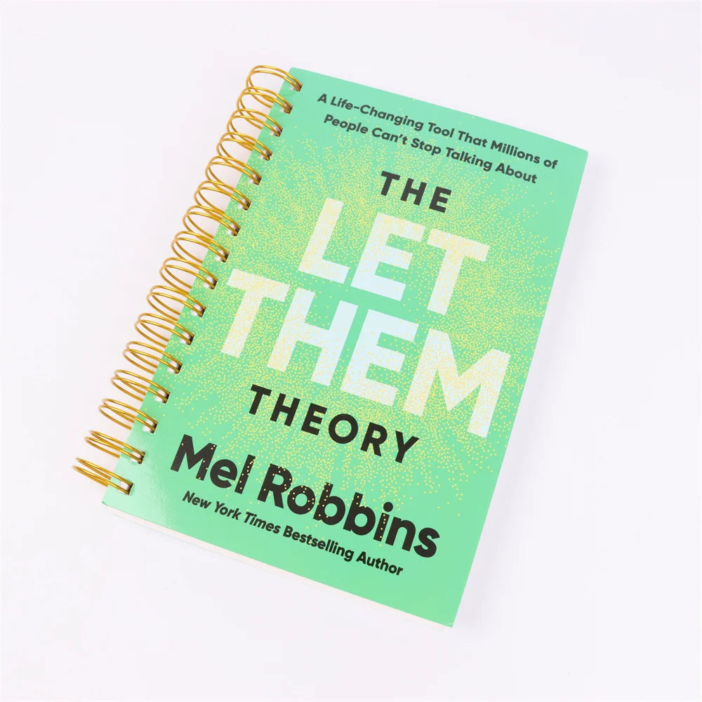 Green notebook with gold spiral binding titled 'The Let Them Theory' by Mel Robbins on a white background