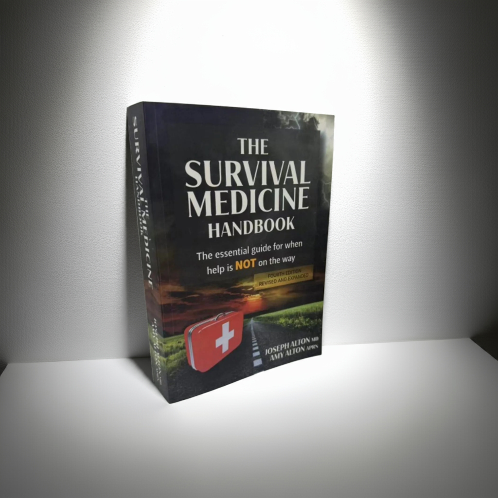 Book cover of 'The Survival Medicine Handbook' with a red first aid kit on a road.