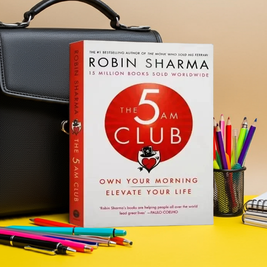 The 5AM Club book cover by Robin Sharma, featuring the title and author's name with a graphic of a clock showing 5am.