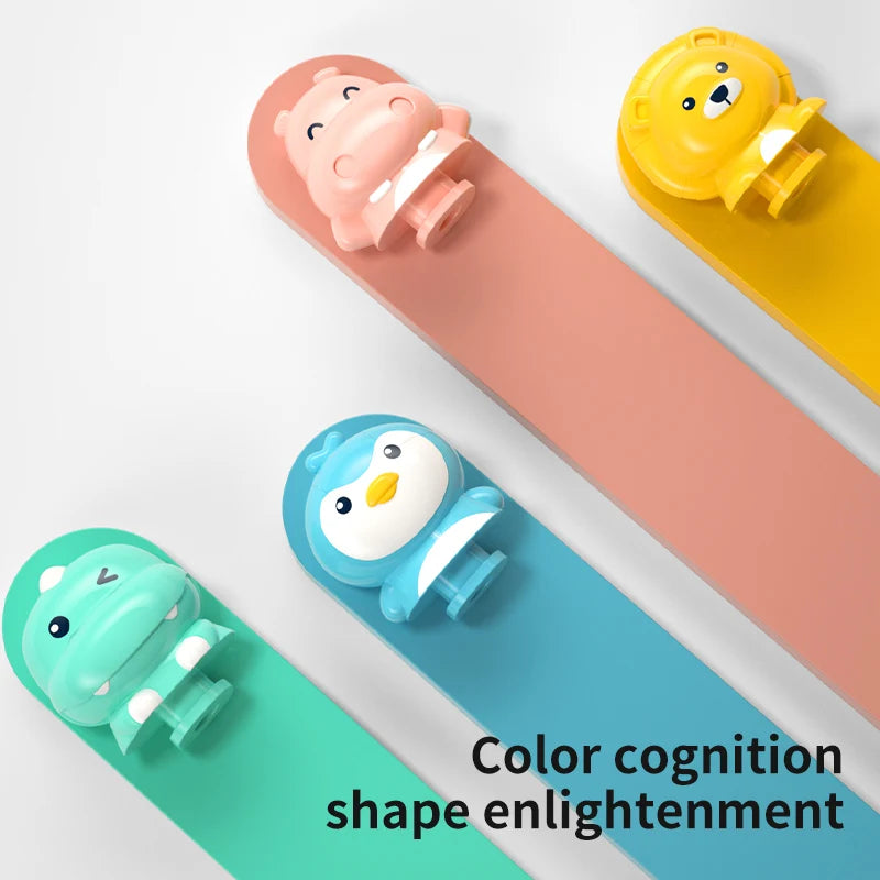 Colorful animal-shaped clips on a white background with text 'Color cognition shape enlightenment'.