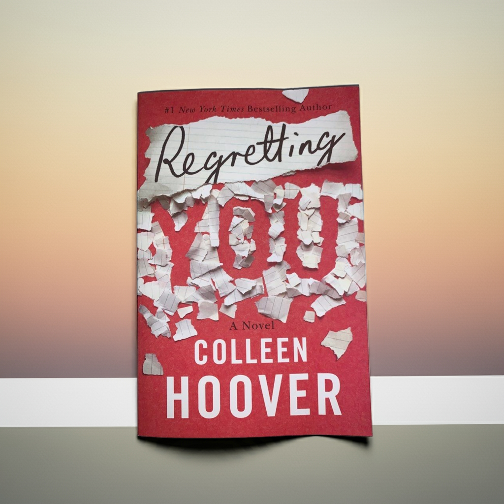 This image features the cover of the novel titled "Regretting You" by Colleen Hoover. The cover design is striking with a bold red background and prominent white text that highlights the title in a dynamic, broken-piece style.